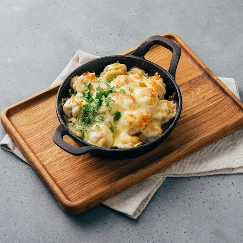 Пельмени с мясом запечённые под сыром